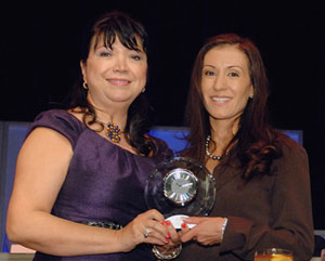 Erika Camacho presented her award by Linda Muzon